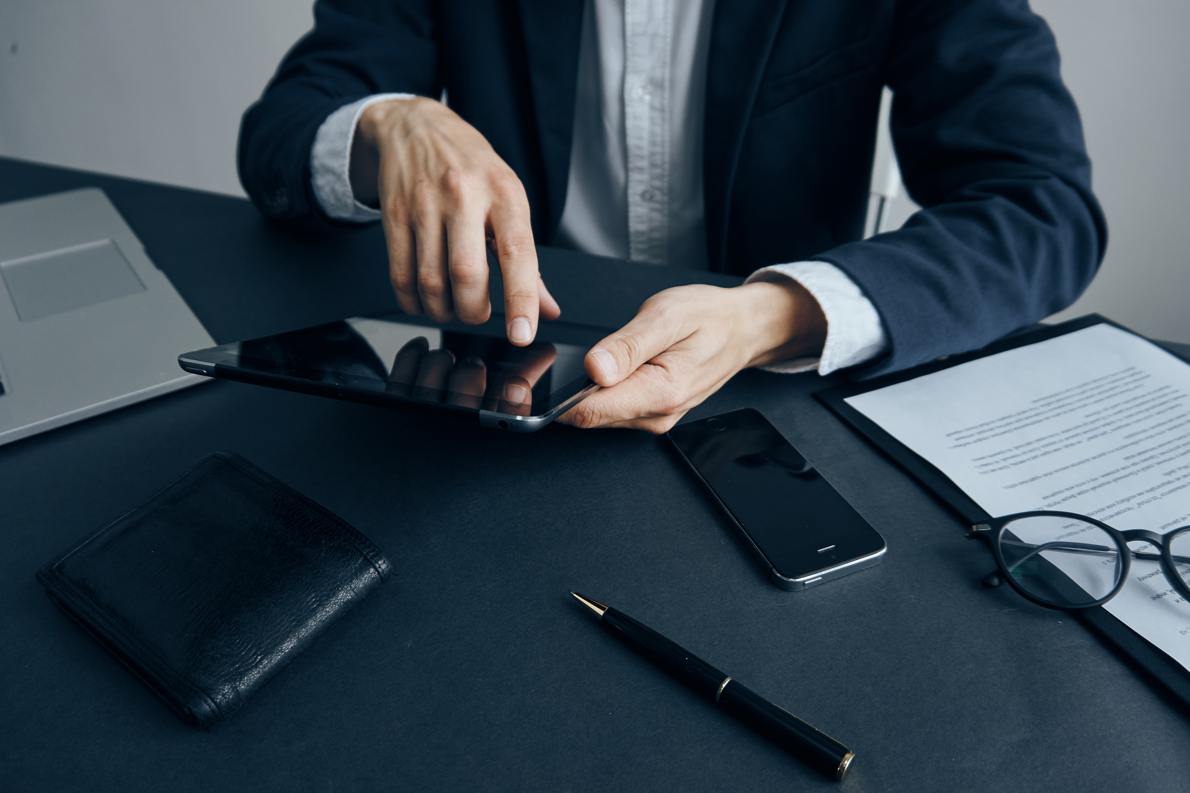 Business Man Sitting at the Table Phone Tablet Technology Internet Finance Office