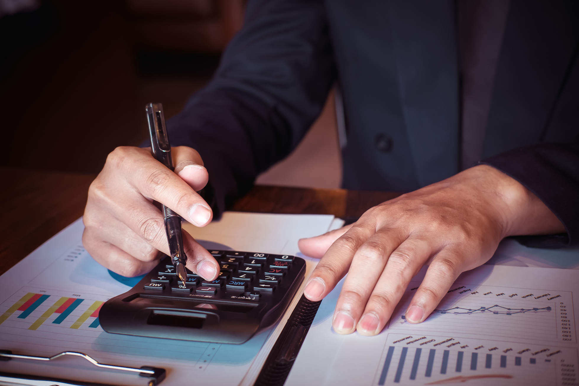 Accountant Calculating Business Expenses